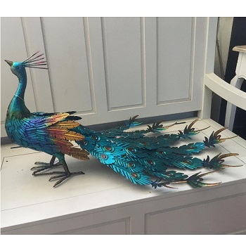 Animali e soggetti in metallo dipinto